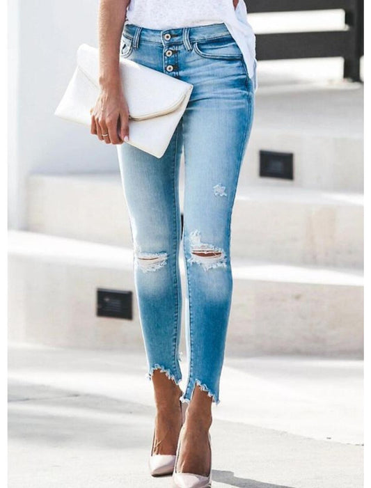 Spodnie jeansowe dopasowane z przetarciami na nogawkach i kolanach Modesty-Spodnie Szorty Spódnice-Evoranow