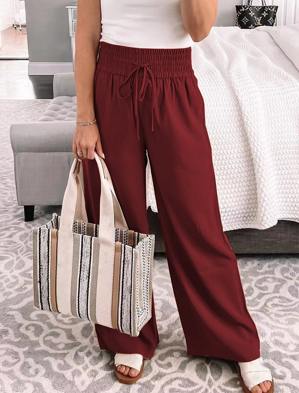 Spodnie luźne z gumką i wiązaniem w talii Beaulah-Spodnie Szorty Spódnice-Evoranow